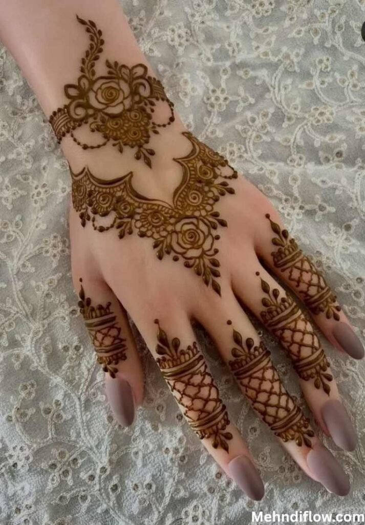 Floral jewelry-style back hand mehndi with lattice finger designs.