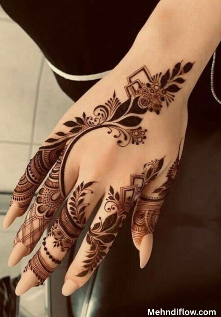 Elegant and modern trailing floral mehndi design extending along the wrist with delicate dotted chain details