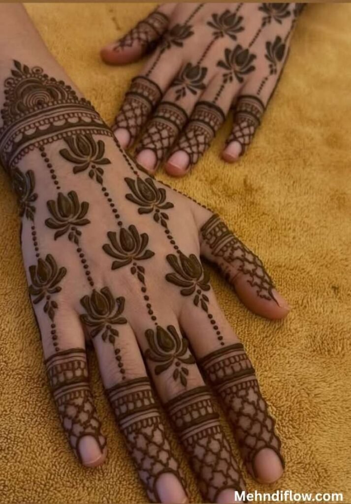 Traditional net and trail back hand lotus mehndi design with intricate striped fingertip details.